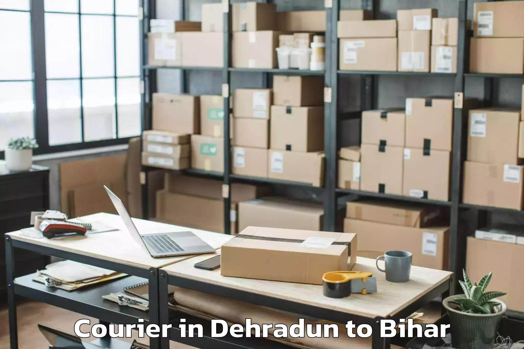 Quality Dehradun to Laukaha Courier